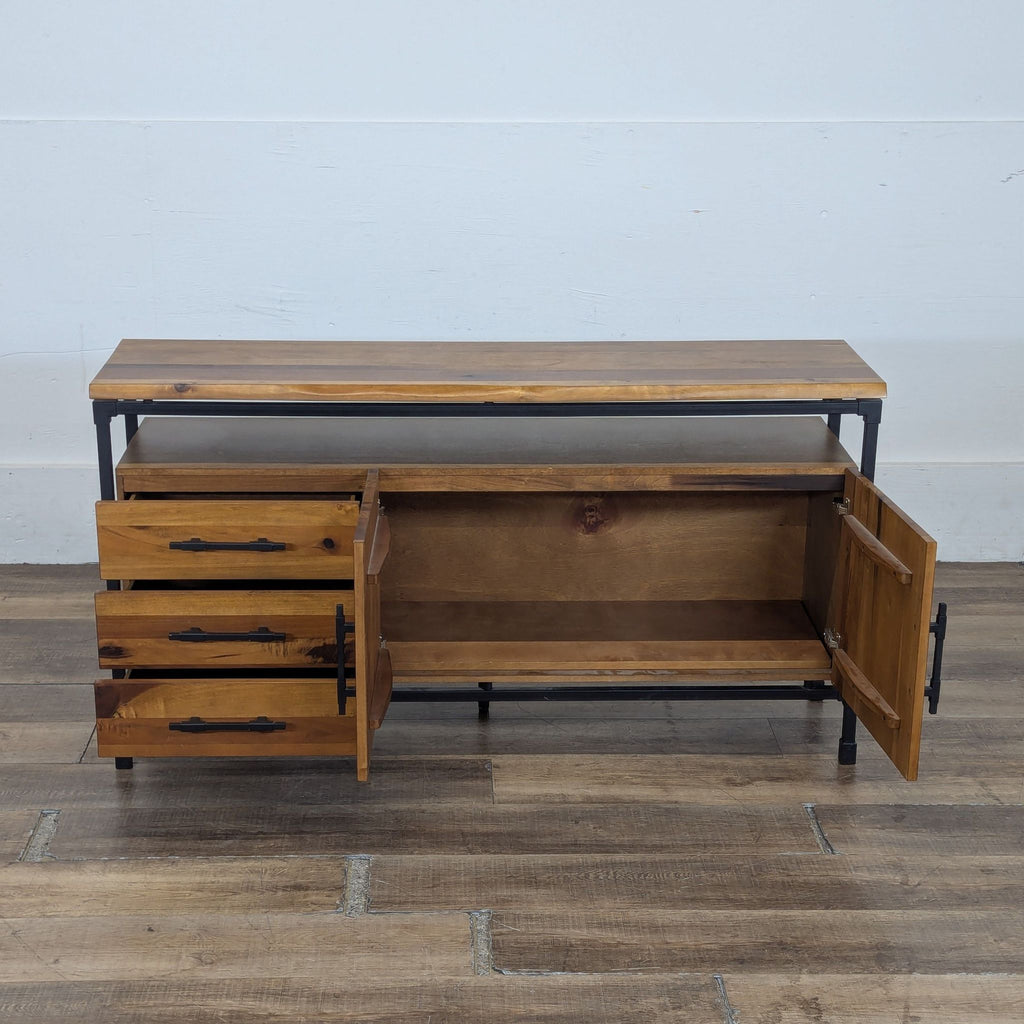 2. Open view of Karsten Sideboard showing three spacious drawers and a double door cabinet with shelf.  