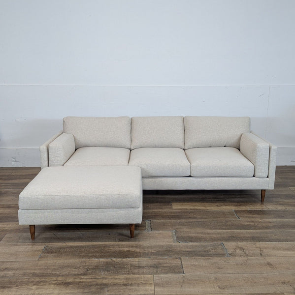 1. Modern sectional sofa by BenchMade Modern with Merrick fabric, thin frame, plush cushions, and walnut tapered legs.
