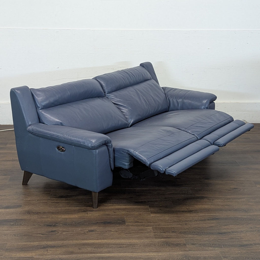 Couch is electric and each side reclines with button on sides to almost flat.
7ft x 3 ft