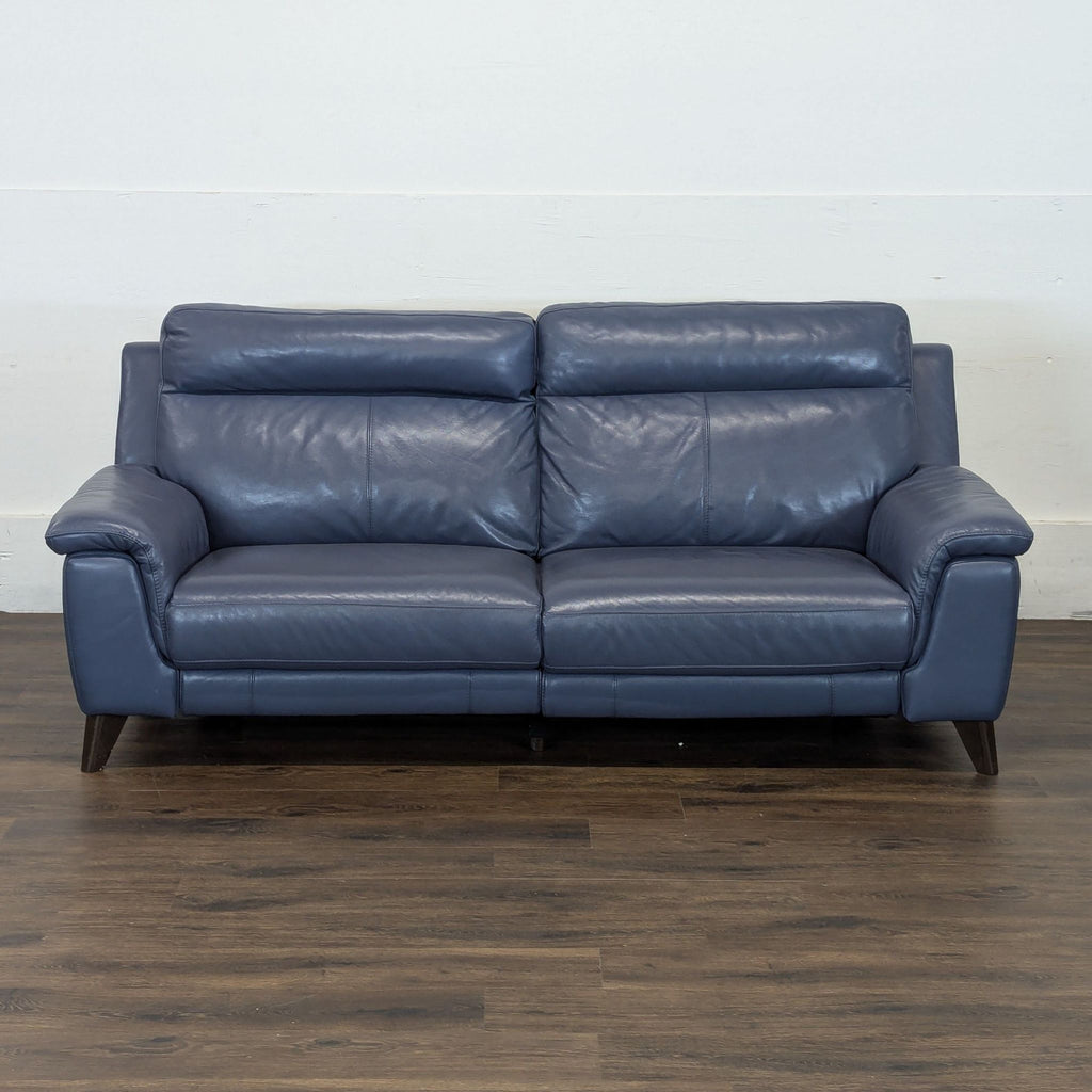 3. Reperch 3-seat electric reclining couch in blue leather, 7ft x 3ft, shown against a plain wall.