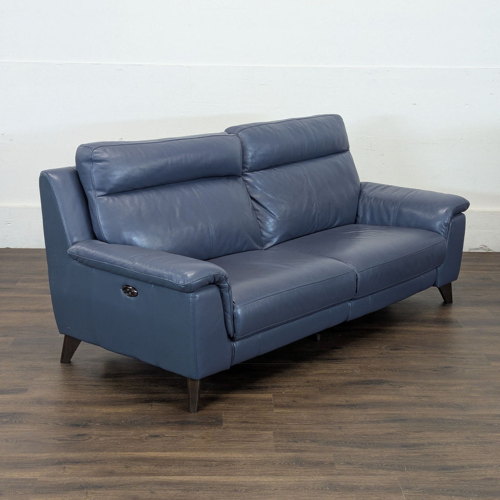 Couch is electric and each side reclines with button on sides to almost flat.
7ft x 3 ft