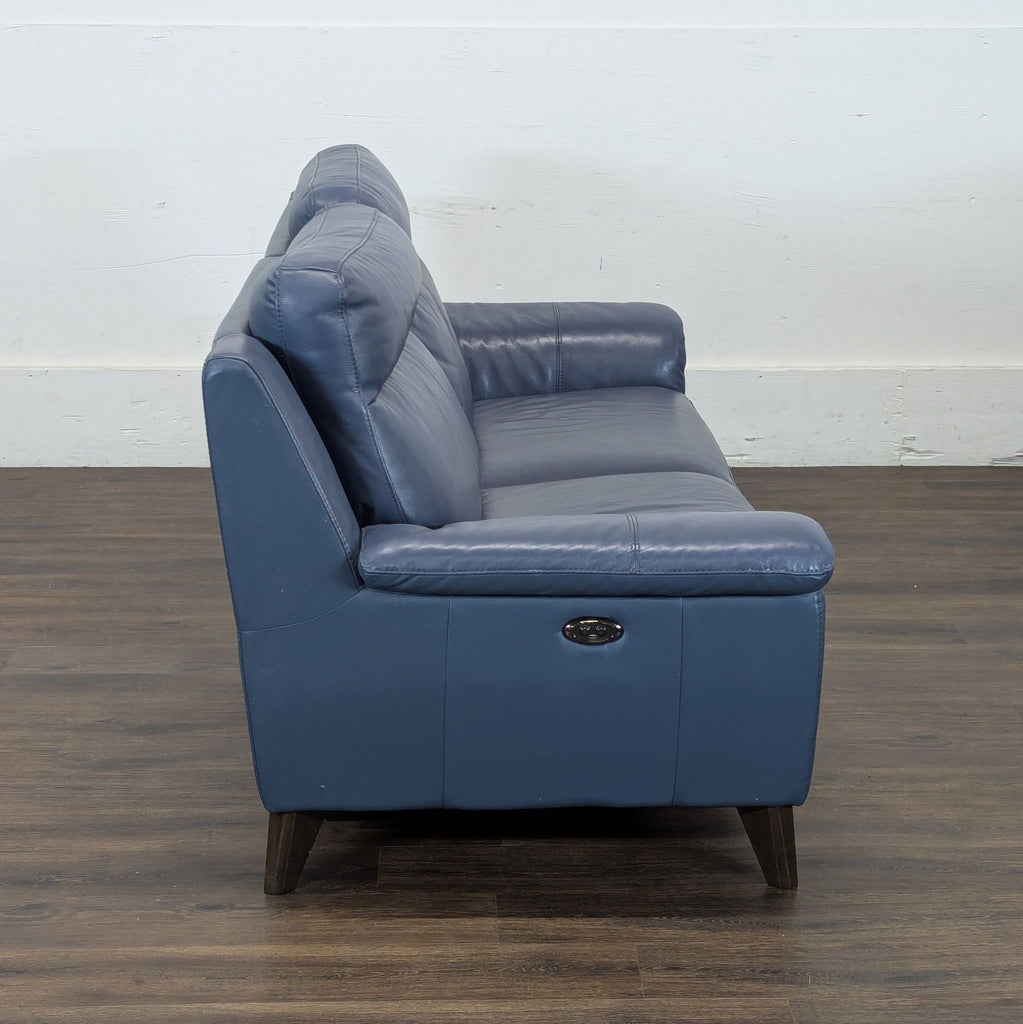 Couch is electric and each side reclines with button on sides to almost flat.
7ft x 3 ft