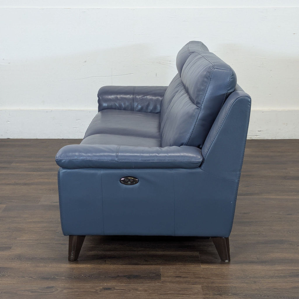 Couch is electric and each side reclines with button on sides to almost flat.
7ft x 3 ft