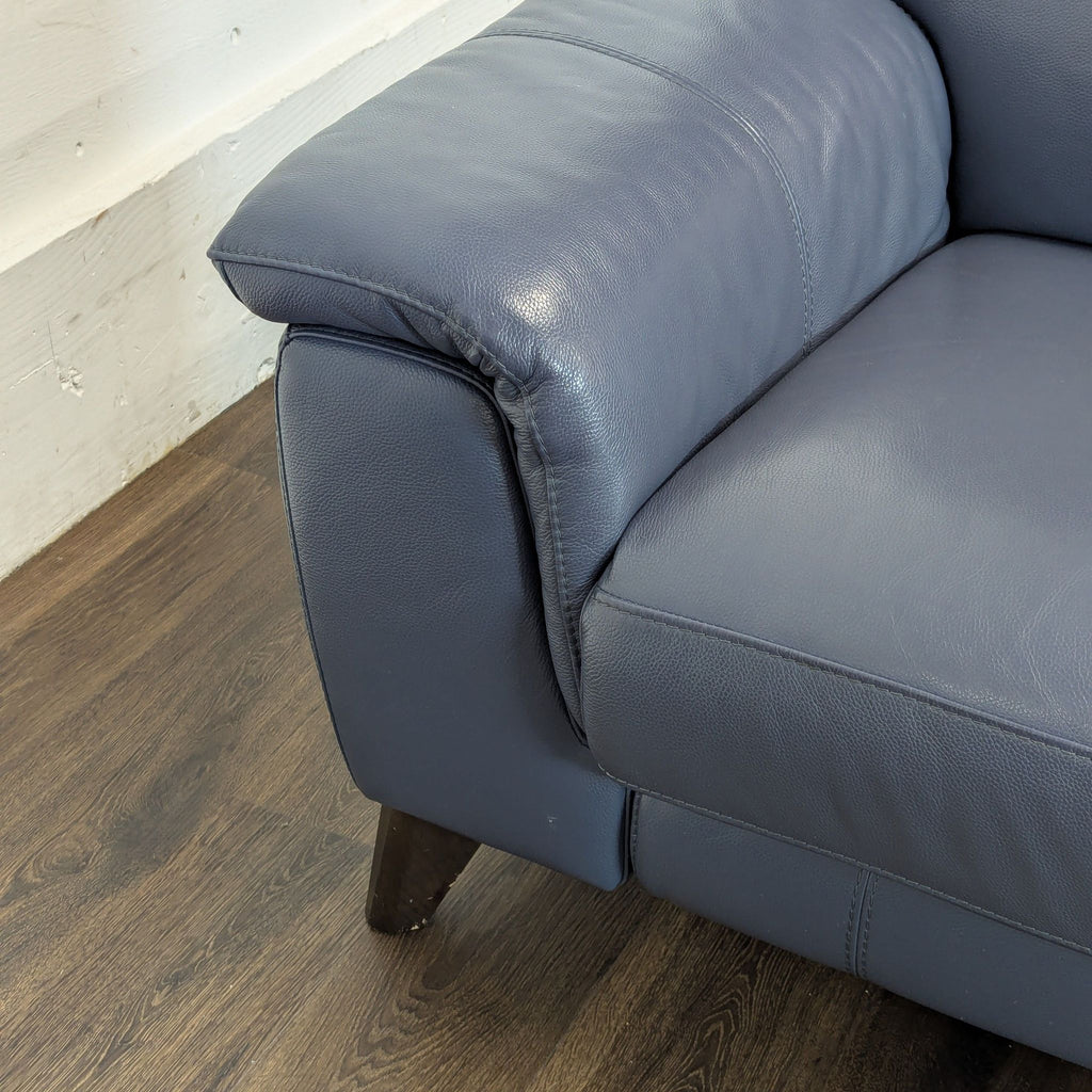 Couch is electric and each side reclines with button on sides to almost flat.
7ft x 3 ft