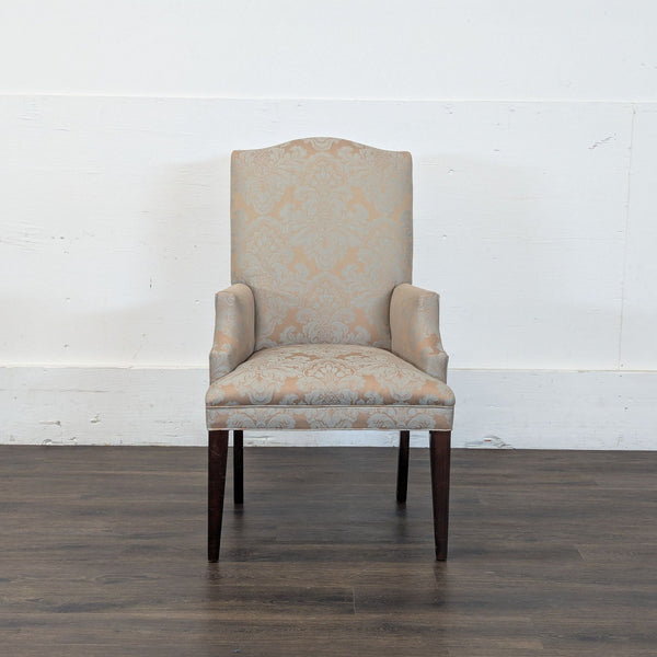 1. Reperch upholstered armchair with high back, damask pattern, and wooden legs, shown from the front.