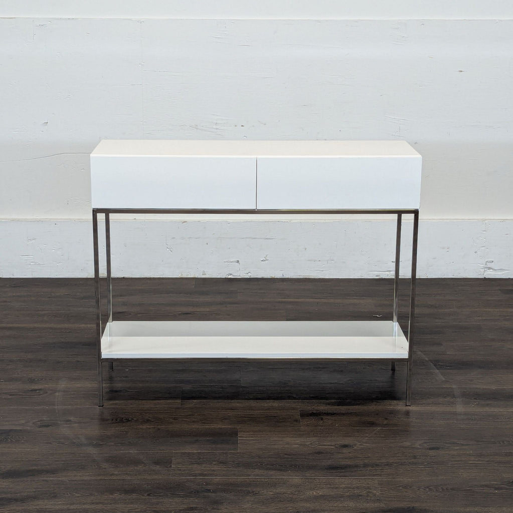 1. Reperch side and console table with a sleek white top, metal frame, and lower shelf on dark wood floor.