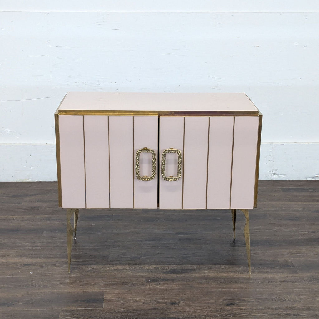 3. Sleek Vintage Italian side table with vertical blush panels, gold accents, and two large decorative handles.