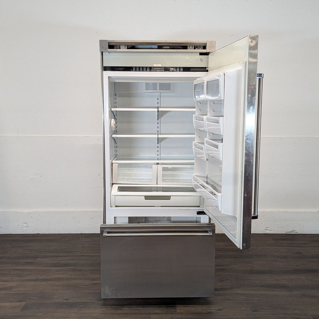 3. Open Viking Professional refrigerator revealing spacious interior shelves, drawers, and door compartments.