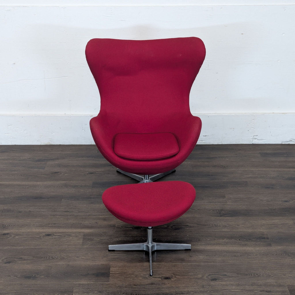 Reperch lounge chair and matching ottoman set in bright red fabric, featuring a contemporary winged design.