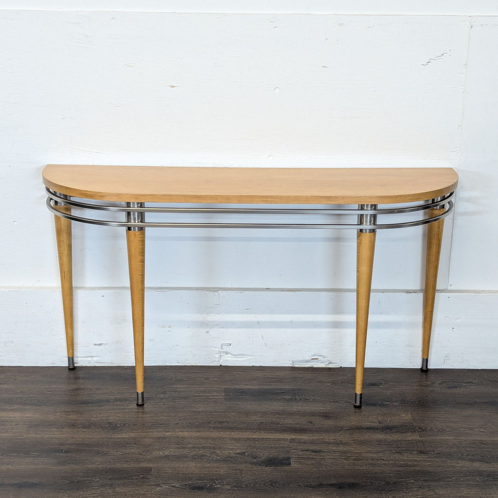 2. Modern Ethan Allen console table featuring a semi-oval wood top, metal detailing, and slender tapered legs.