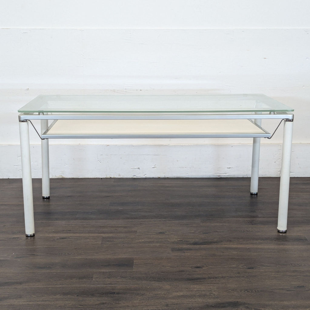 3. Reperch dining set glass table with white legs, shown alone on a dark wooden floor.
