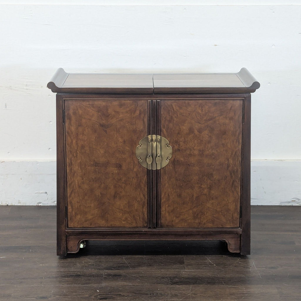 1. Drexel sideboard with burl wood cabinet doors, brass hardware, and casters, viewed from the front.  