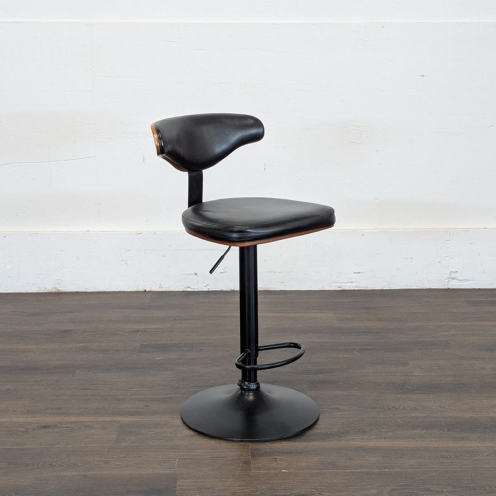 3. Adjustable-height Ashley Furniture stool with footrest, black upholstery, and mid-century style for home bar or kitchen.