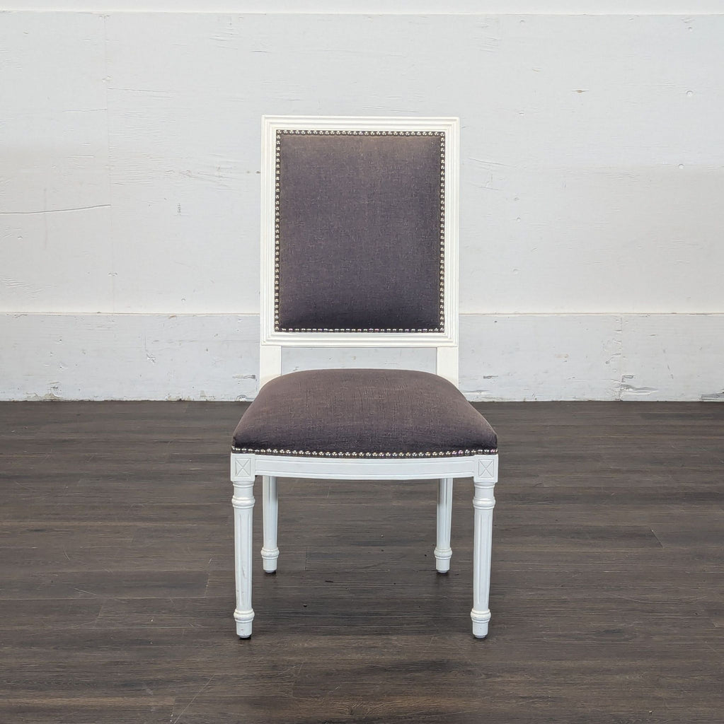 Gray linen white chairs
Back of Jonathan Adler chairs