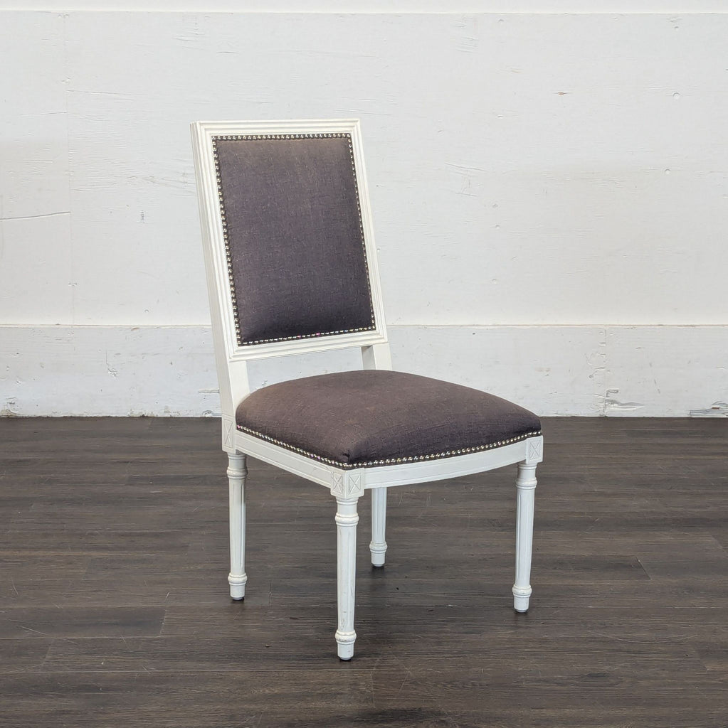 Gray linen white chairs
Back of Jonathan Adler chairs