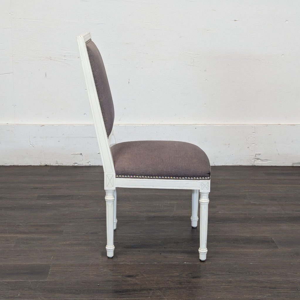 Gray linen white chairs
Back of Jonathan Adler chairs