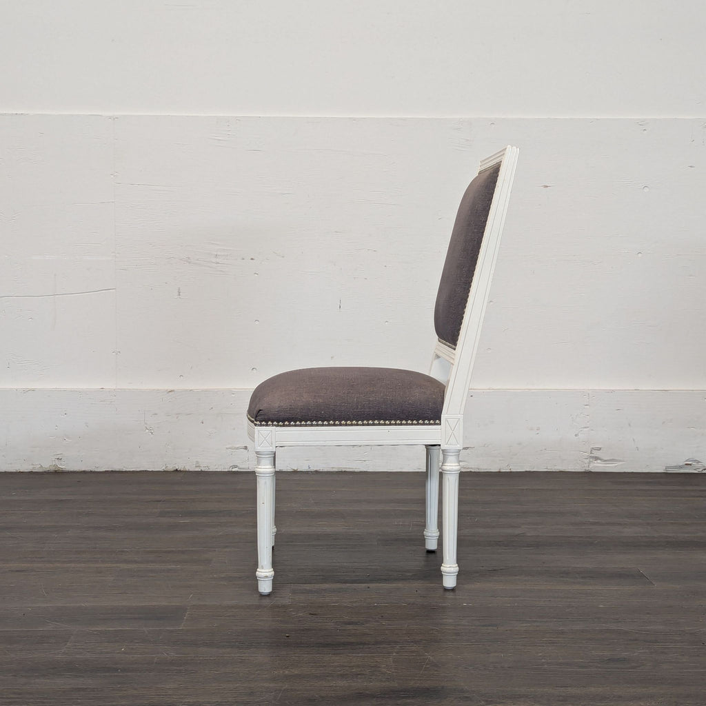 Gray linen white chairs
Back of Jonathan Adler chairs