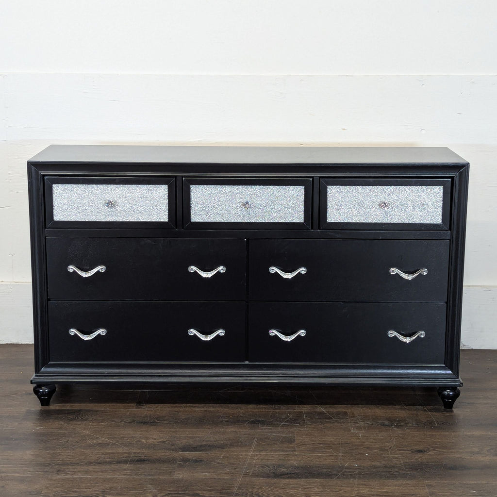 2. Sleek wooden dresser by Coaster featuring clean lines and elegant drawer handles.  