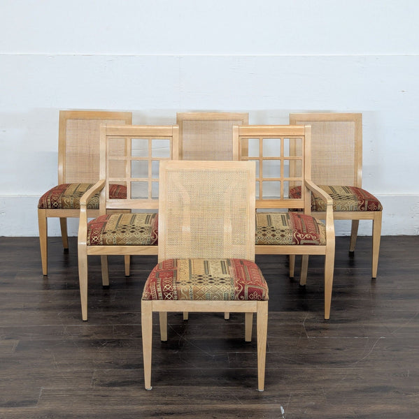 1. Set of dining chairs with natural wood frames, cane backs, and patterned upholstered seats arranged in rows.