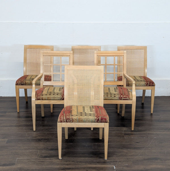Dining chair with natural wood frame, cane backrest, and cushioned upholstered seat.  