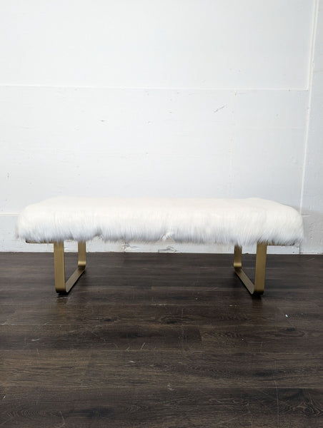Faux fur bench with gold-toned sled legs, from Restoration Hardware, in the Stools, Ottomans & Benches category.  