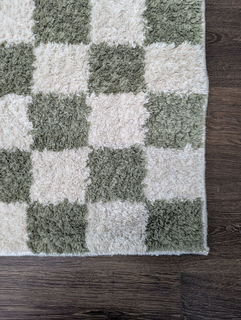 5'2" x 7' Livabliss Fossay Rug, featuring a bold checkerboard pattern, category: Rug, price $200.