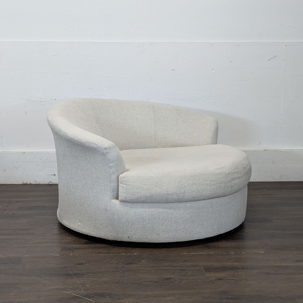 3. Ashley Homestore cream boucle cuddler chair, oversized and round; gently used and well maintained.