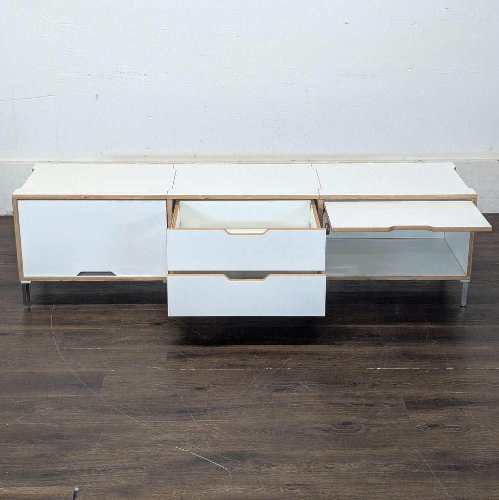 Minimalist Scandinavian cabinet with smooth finish, ideal for contemporary living spaces.