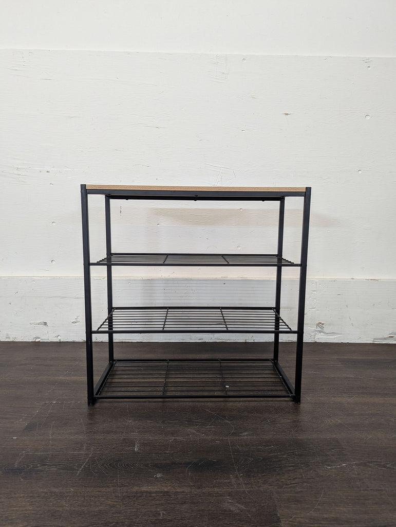 Modern side console table functioning as a shoe rack, featuring open tiers for neatly displaying shoes.