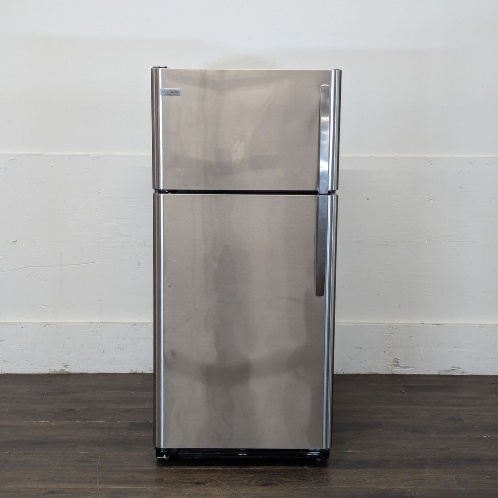 2. Modern Frigidaire refrigerator, shown in standard upright position.