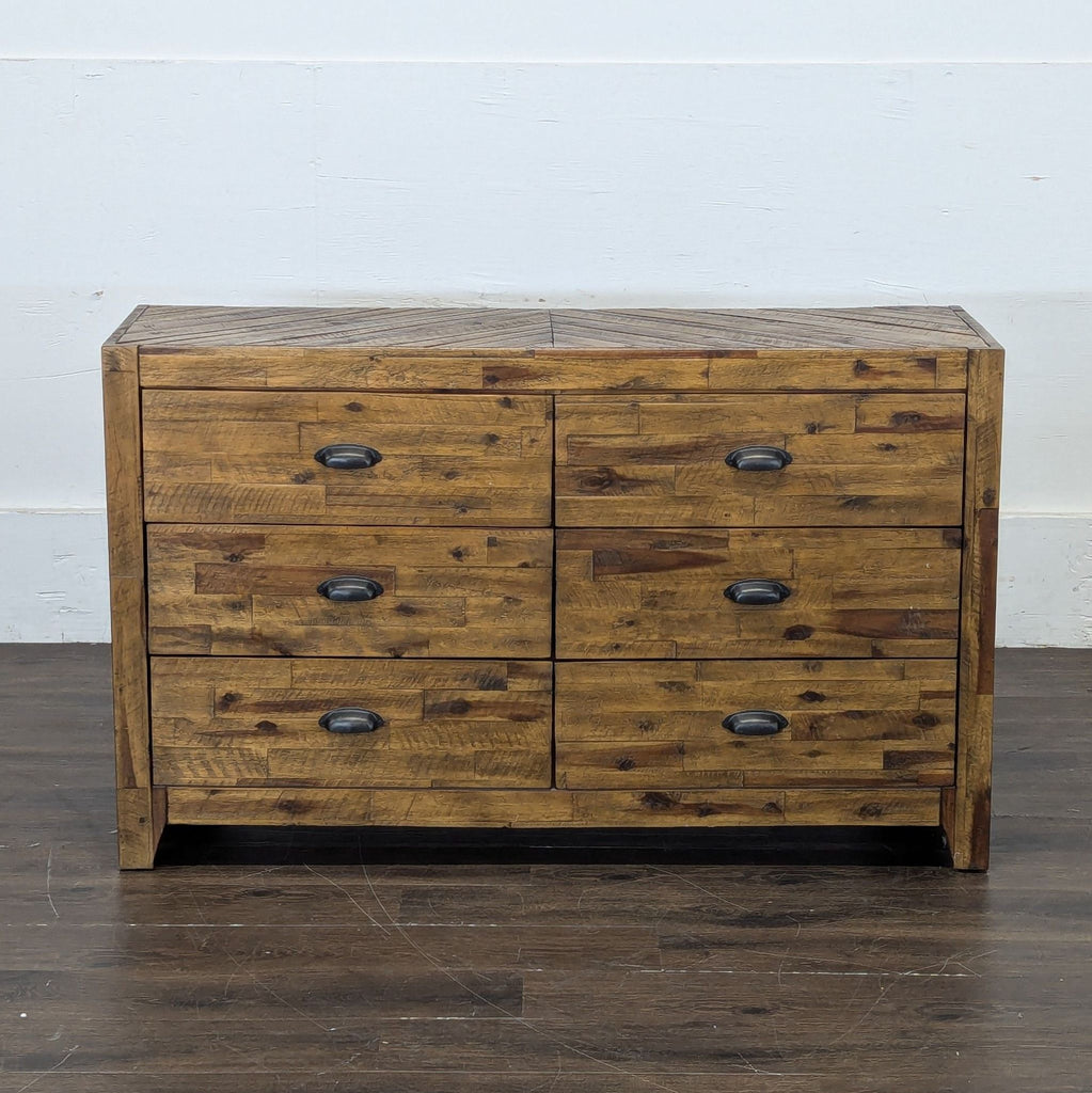 1. Modern wooden dresser with six spacious drawers and sleek metal handles.
