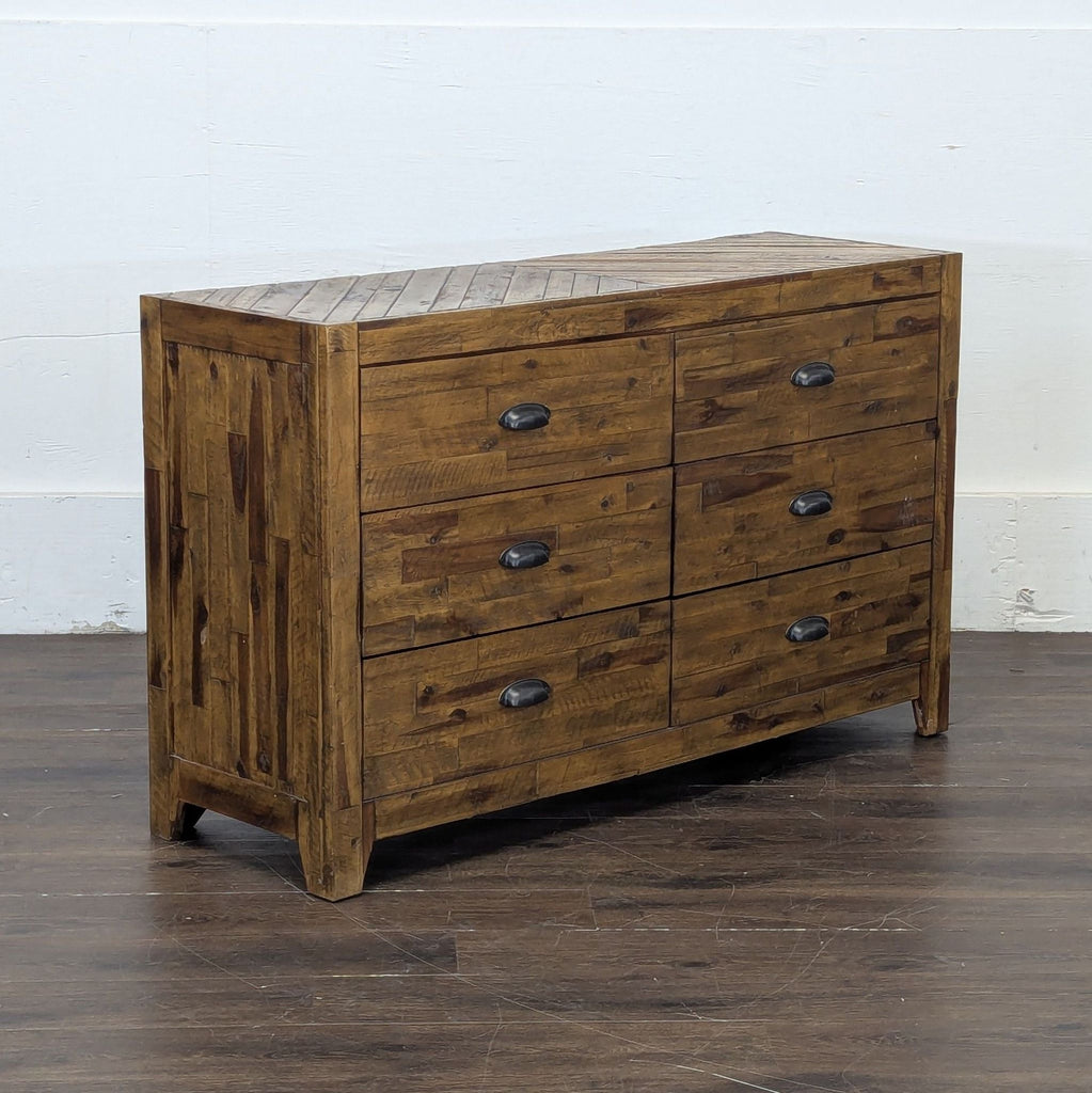 2. White dresser featuring a minimalist design and ample storage space.