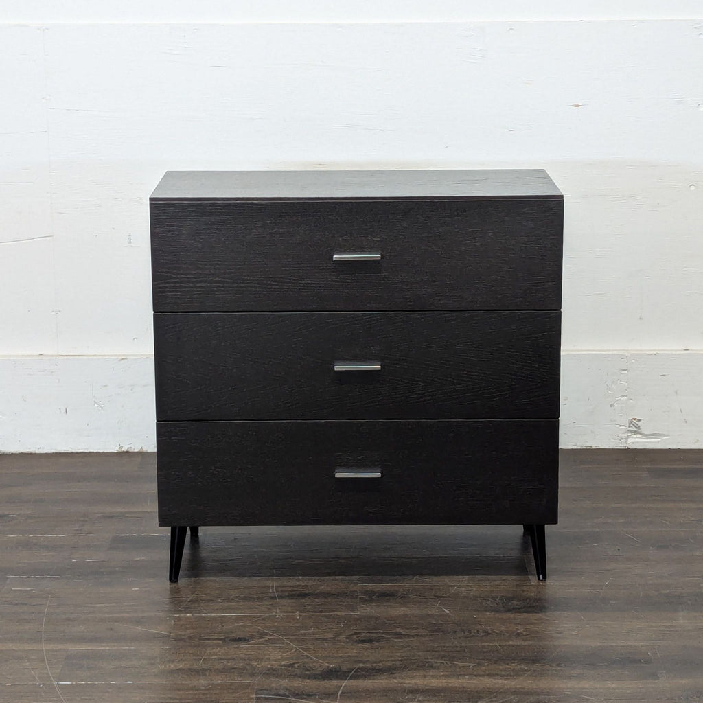 1. Modern wooden dresser with six spacious drawers and sleek metal handles.