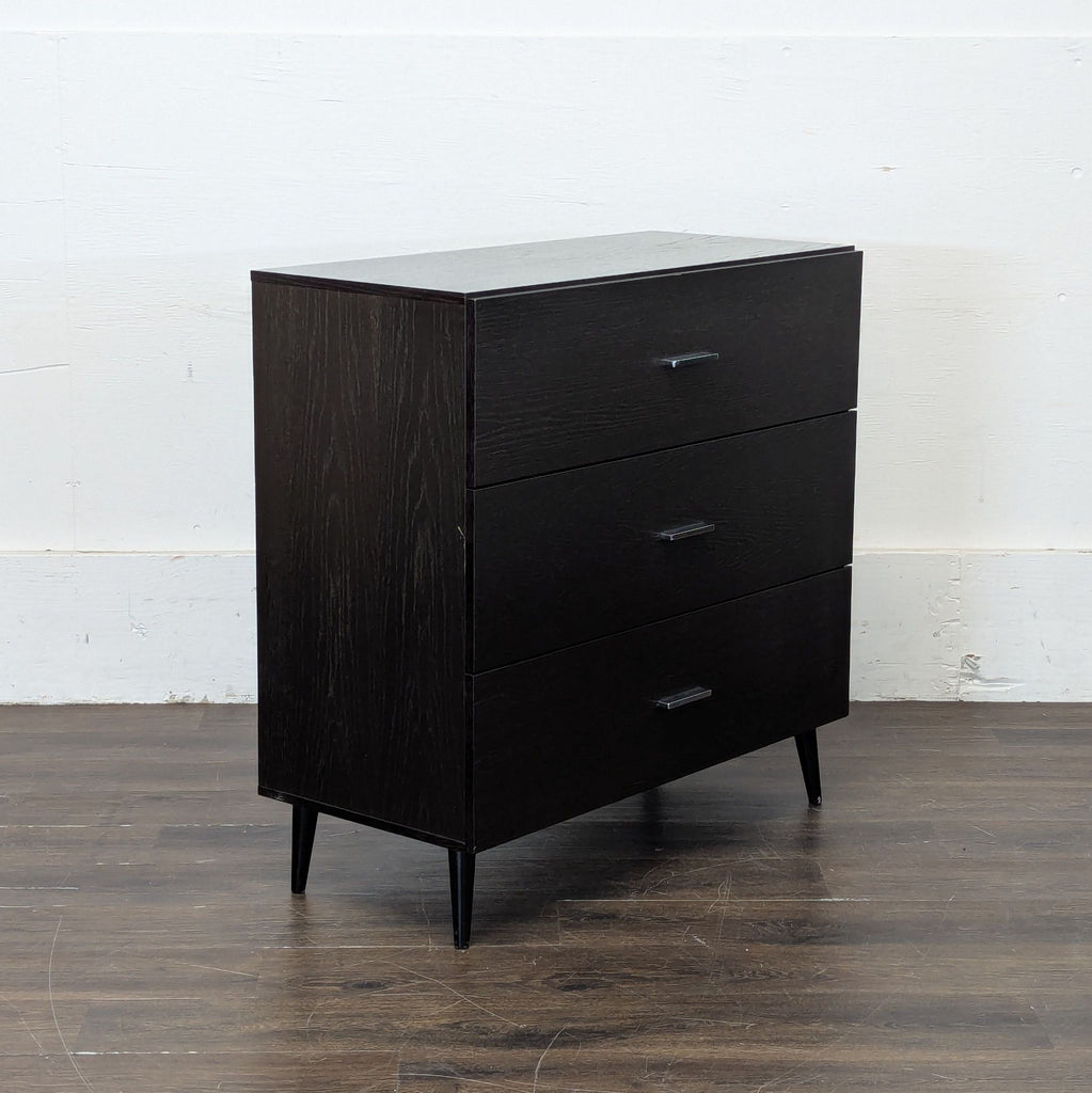 2. White dresser featuring a minimalist design and ample storage space.
