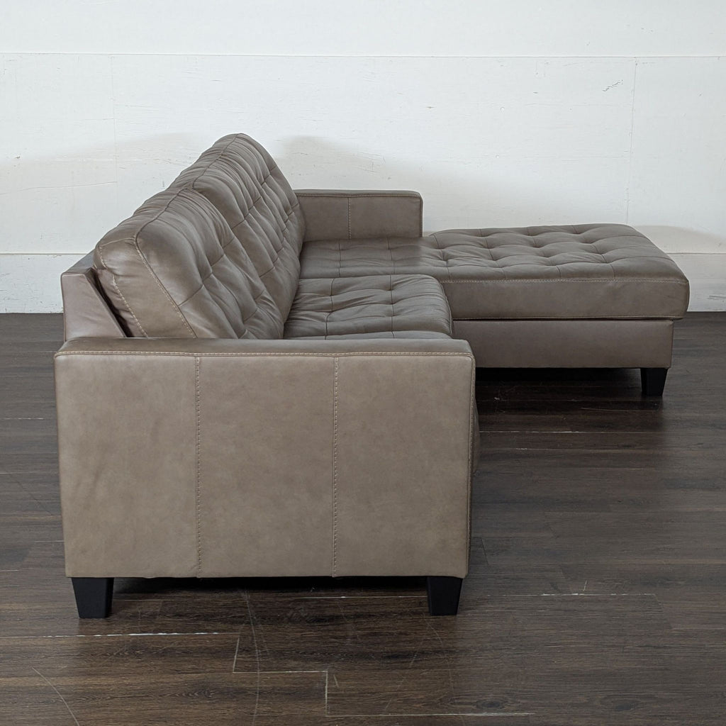 Brown leather sectional, a year old