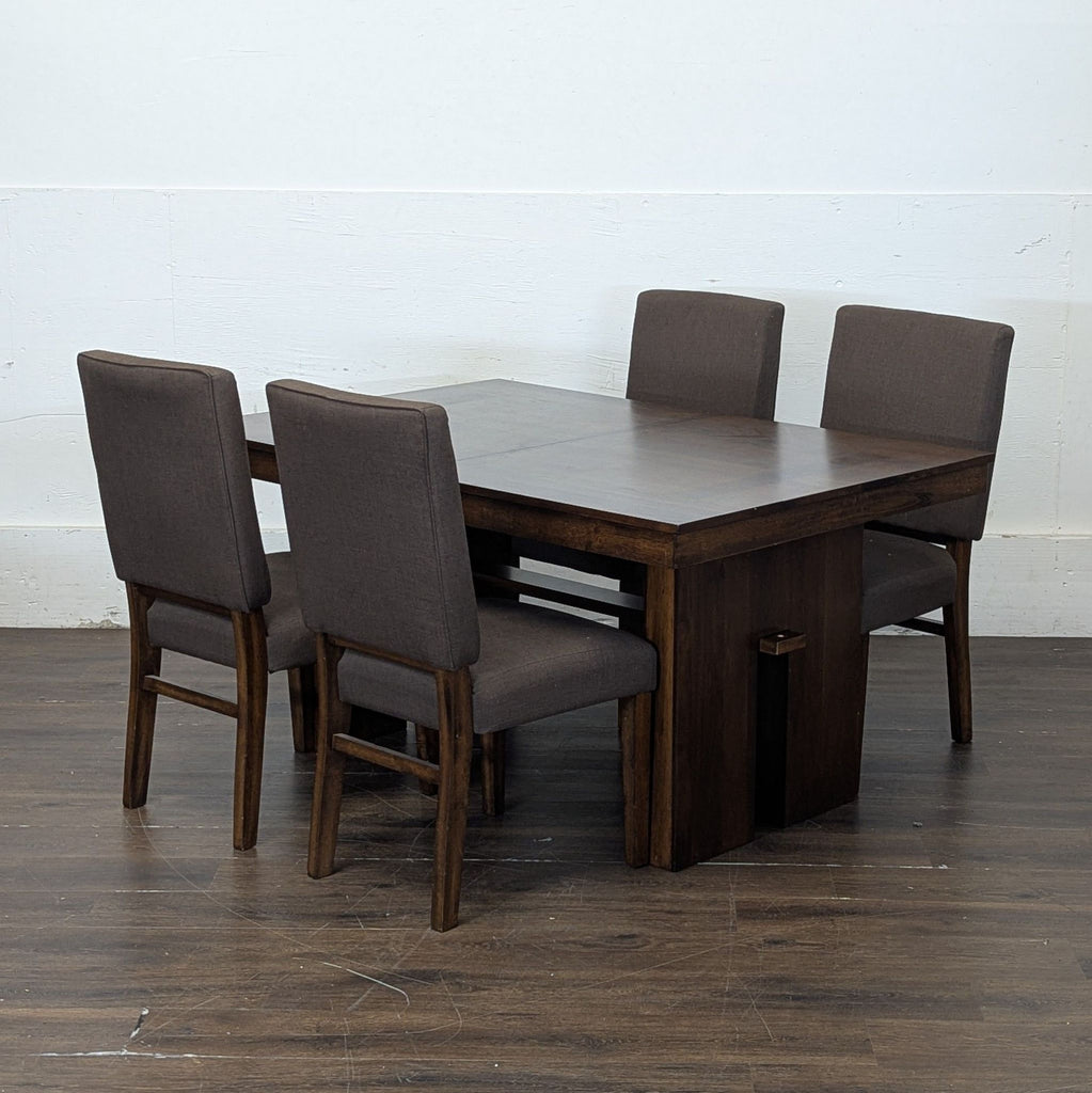 3. Norcal Furnitures dining table set showcases elegant wood design with comfortable seating for family meals.