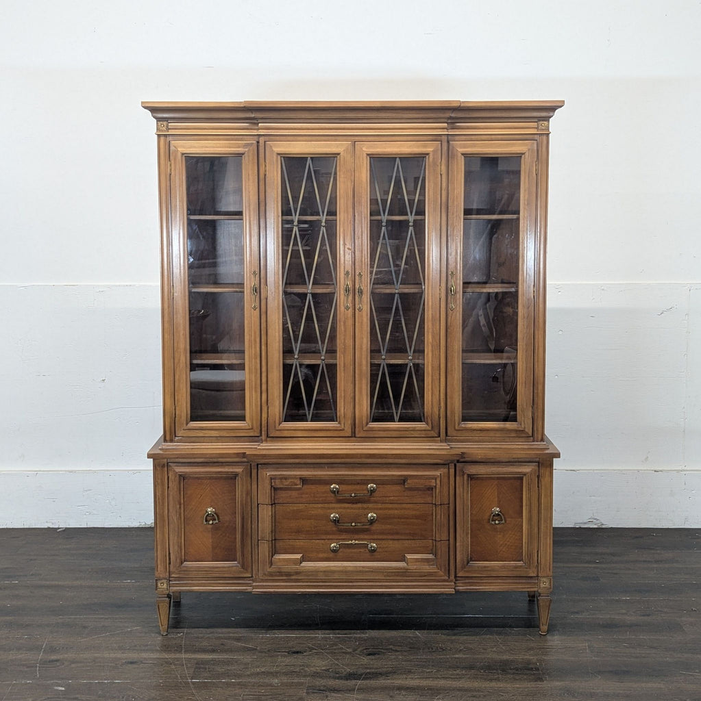 3. Thomasville Hutch & Armoire combining display shelves and cabinet storage in a sophisticated wood style.