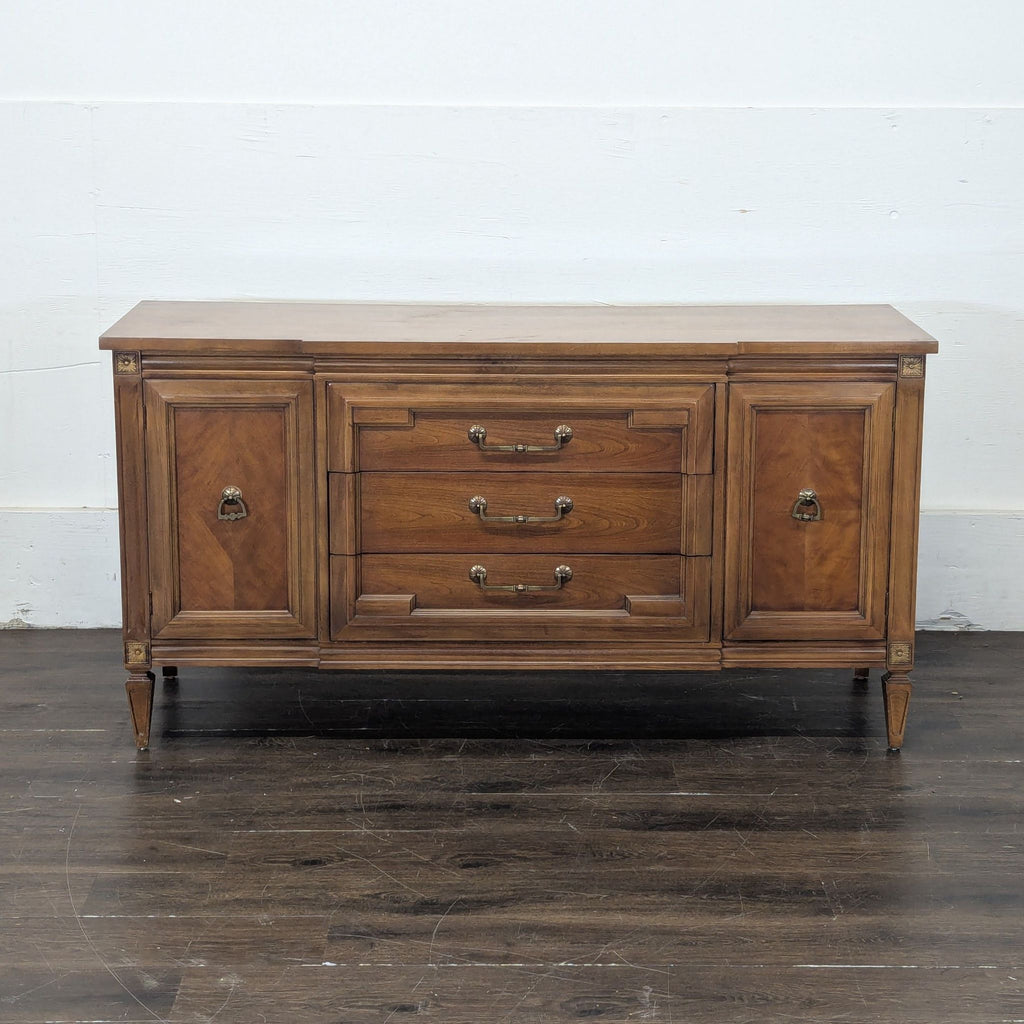 Sleek wooden sideboard with minimalist design, perfect for modern living spaces.  