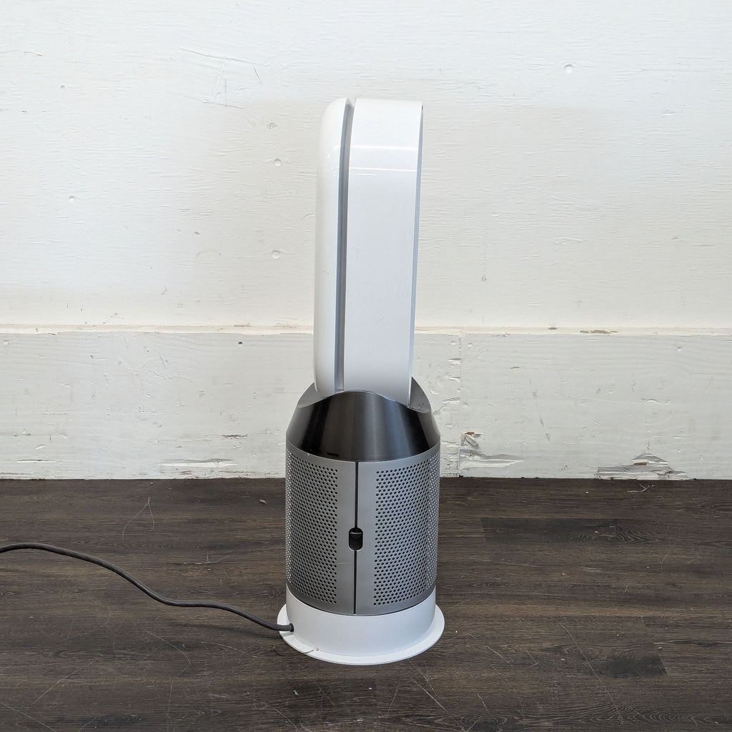 3. Close-up of Dyson Cooler/Heater, highlighting the brand’s logo and streamlined bladeless cooling technology.