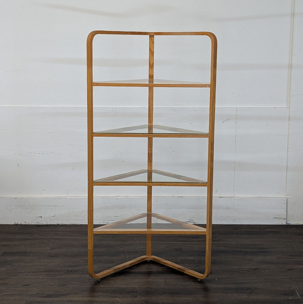 1. Modern wooden bookshelf with five open shelves, displaying books and decorative items in a living room setting.