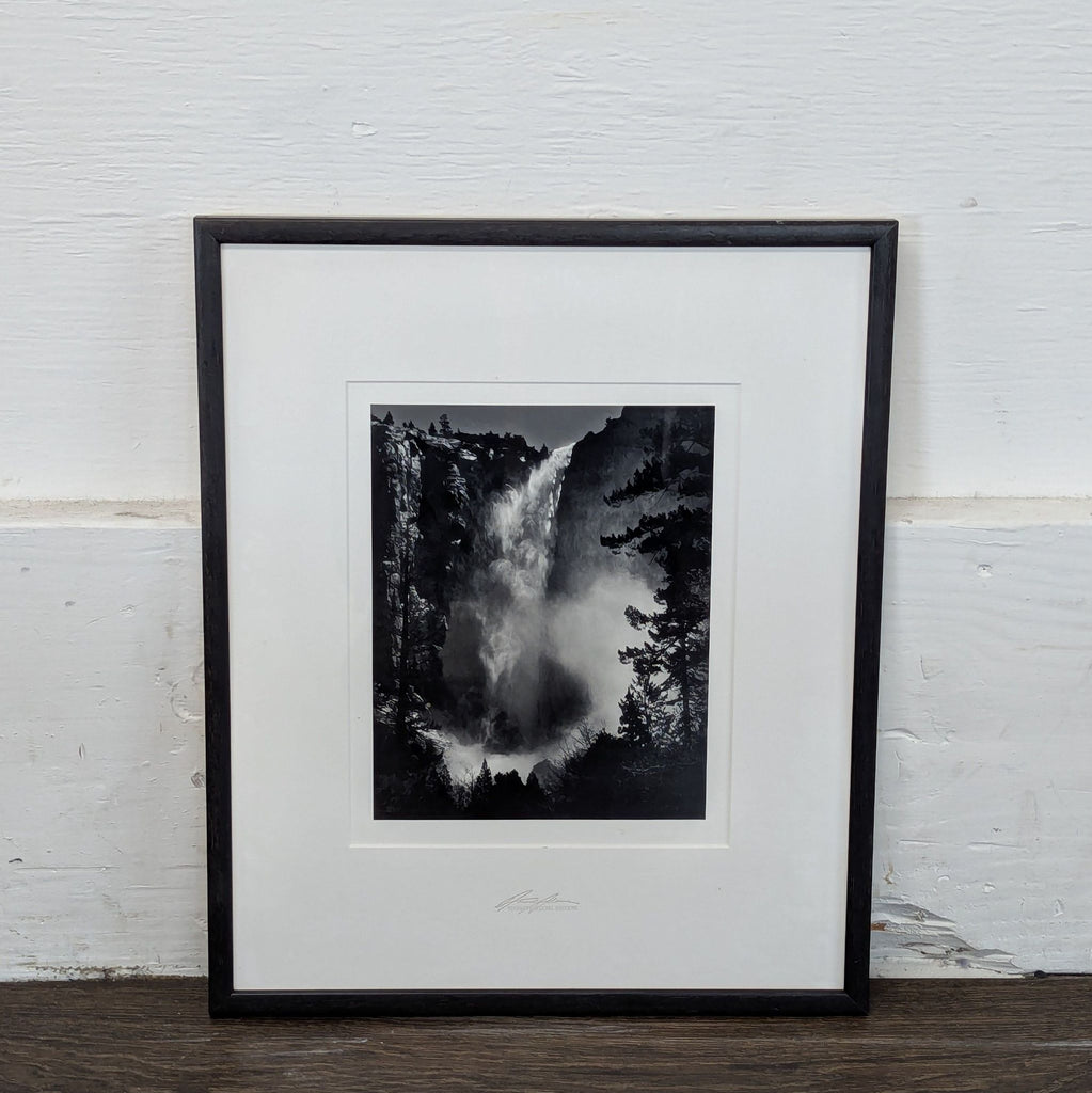 2. Black frame with a monochrome waterfall photograph, surrounded by white mat, labeled Yosemite Special Edition.