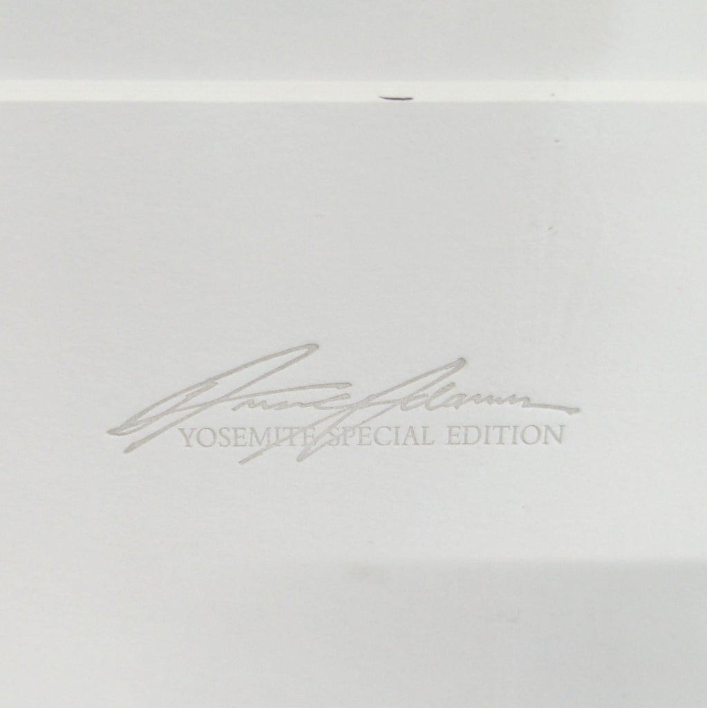 3. Close-up of embossed Yosemite Special Edition signature and text on white mat of a framed photographic print.