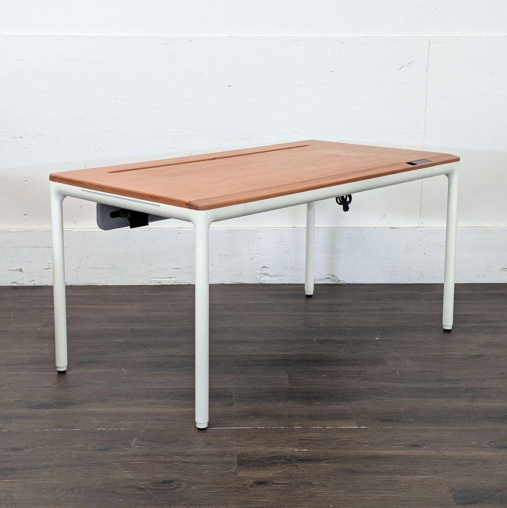 Adjustable smart desk in the Desks category with a wood tabletop and a contemporary white metal frame.
