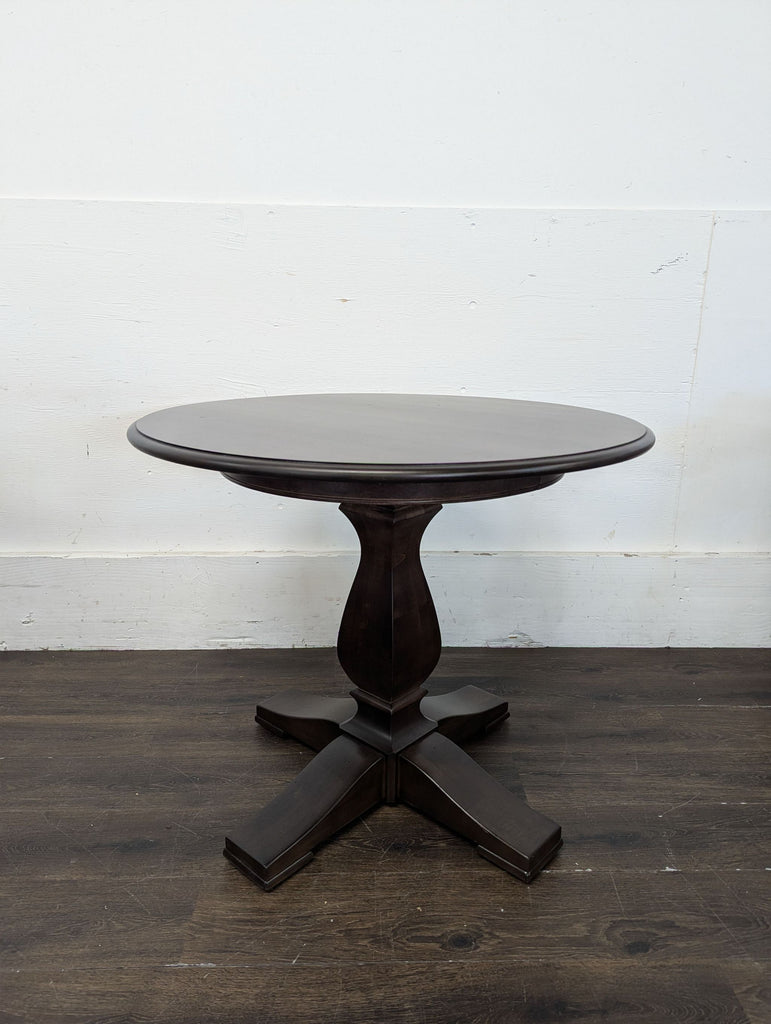 1. Modern rectangular coffee table with a glass top and wooden legs, suitable for contemporary living rooms.