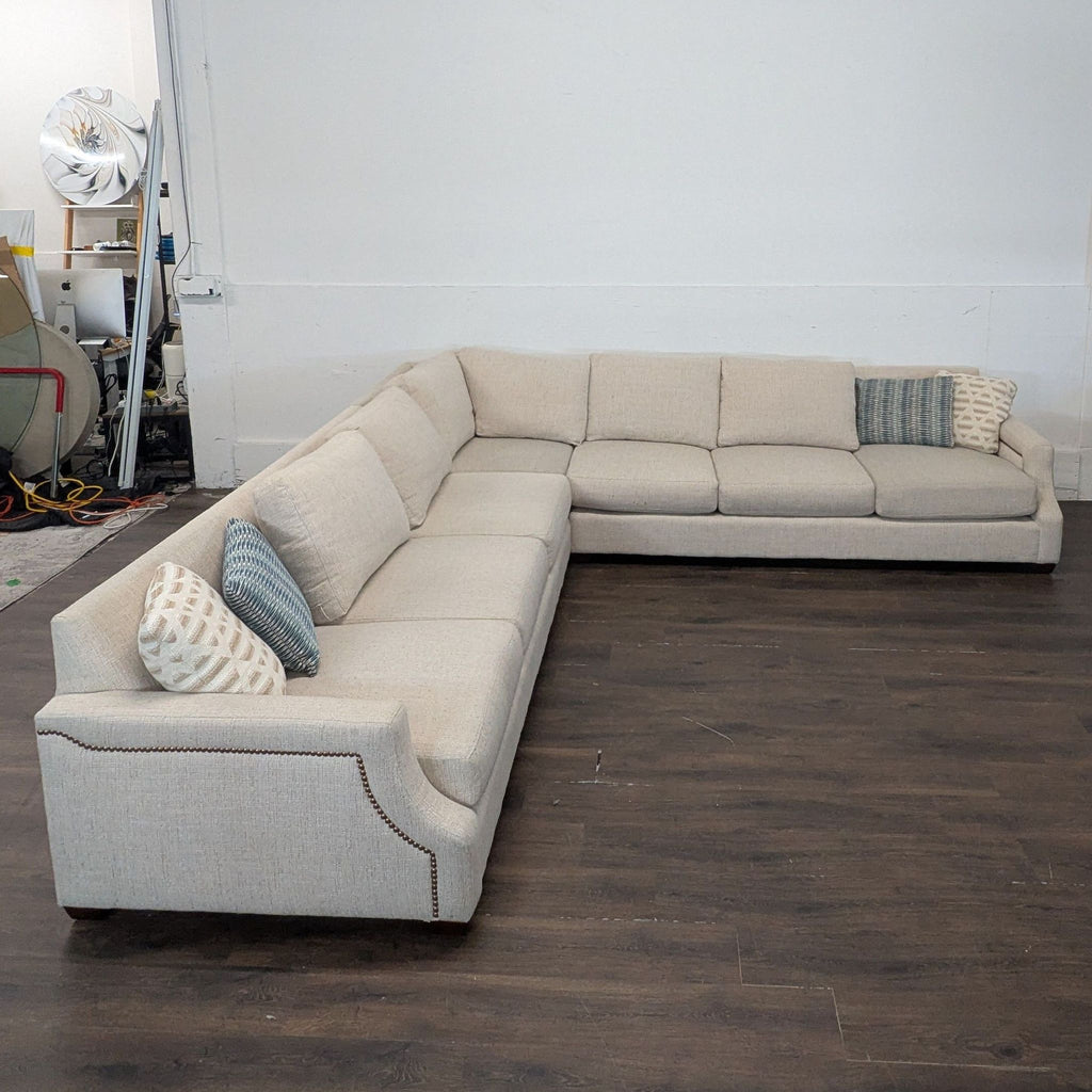 Haverty's sectional couch, model Baldwin Natural, gently used, neutral color, modern design, purchased for $5,191.99.