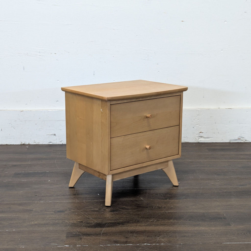 2. Elegant glass-top end table featuring a metal frame and decorative lower shelf for extra storage.