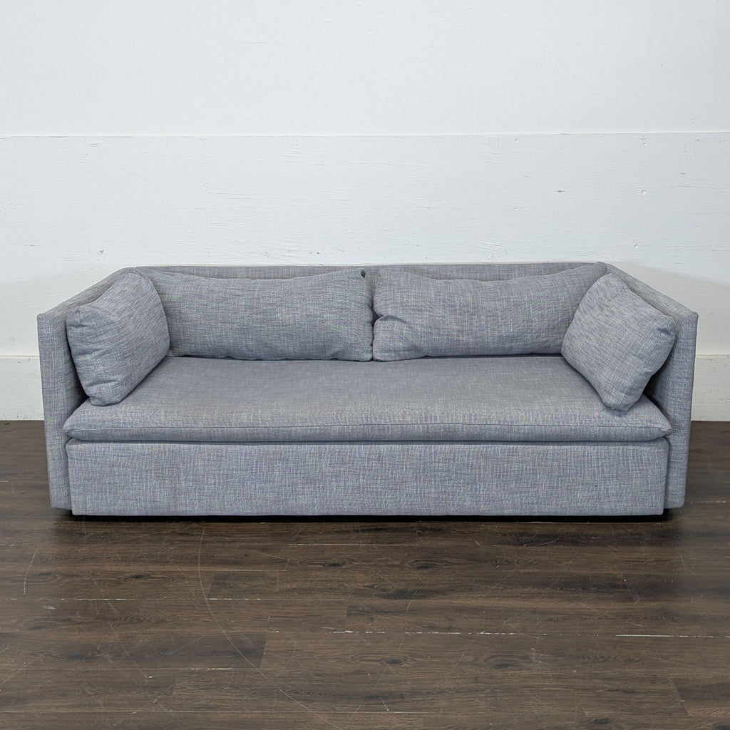 3. Spacious West Elm Marin Sofa, three-seater with sleek lines and cozy fabric, ideal for modern interiors.
