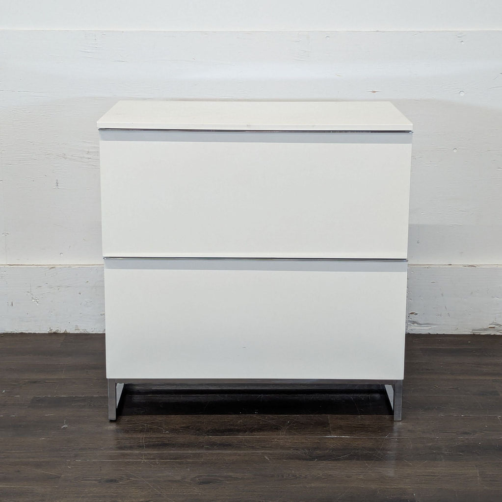 3. Contemporary Scandinavian Design dresser with a smooth top and understated metal handles.