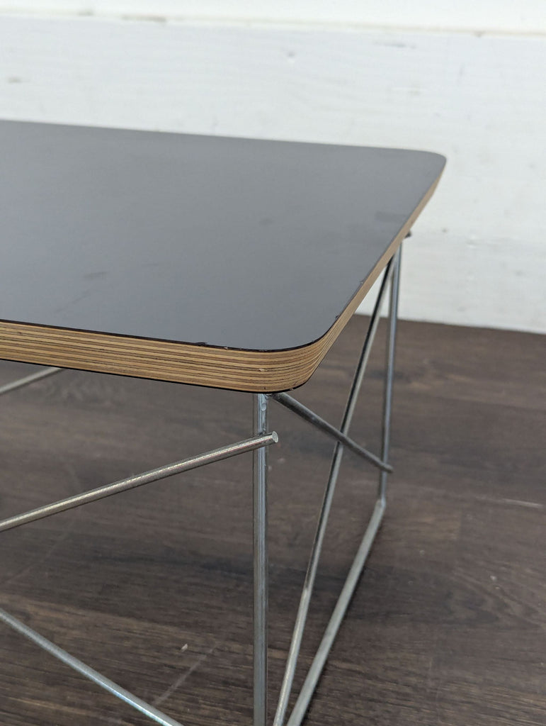 Wooden entertainment center with folding end table