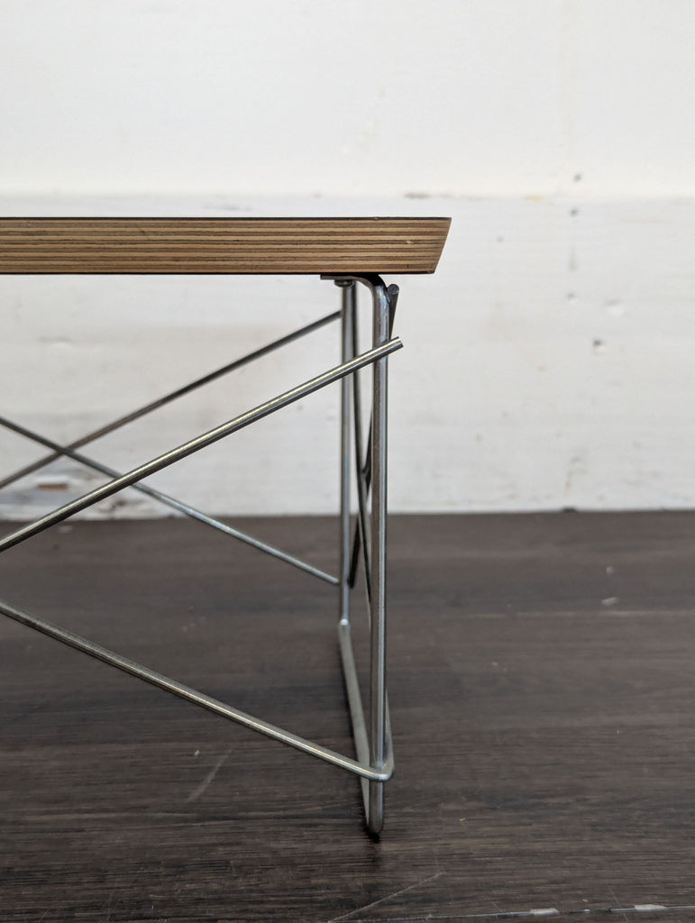 Wooden entertainment center with folding end table
